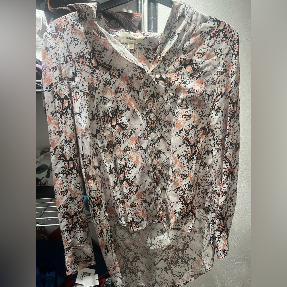 nice coral, white, and black blouse